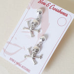 calico-mary-skull-crossbones-earrings-more-colours-bow-crossbones-ltd-662643_1024x1024_2x_229baacd-7d93-49be-b0c8-8f66277adbe8